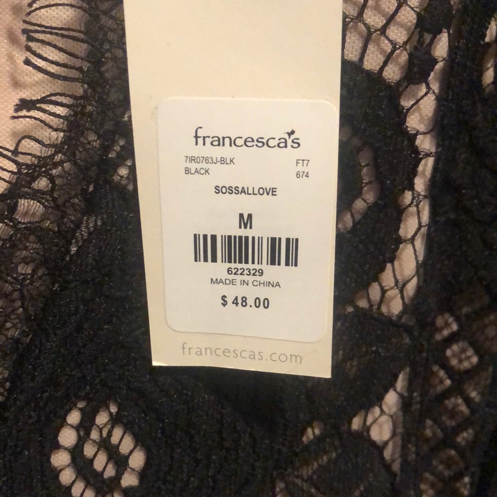 Tan & Black romper from Francesca’s. Never worn, tags still on.
